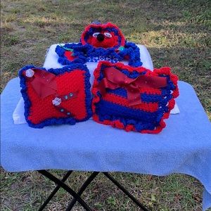 Two small pillows and one animal pillow